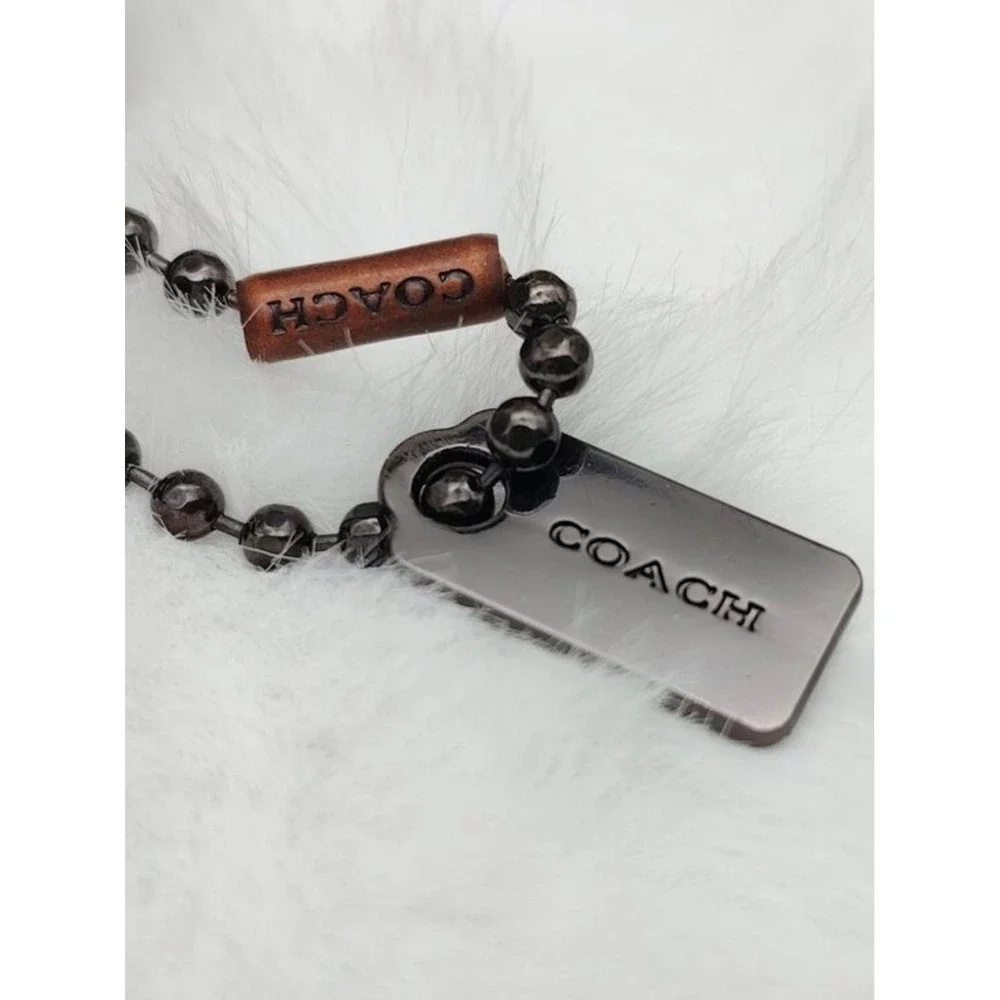 Coach x Keith Haring Dancing Man Glitter Leather Bag Charm Keychain Pink Brown